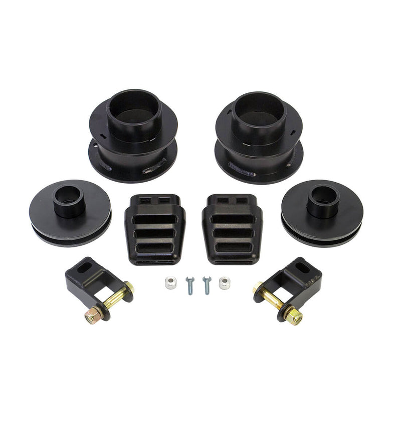 ReadyLIFT SST Lift Kit, full kit on a studio background: front and rear black coil spacers, bump stop extensions, two shock brackets and hardware on white