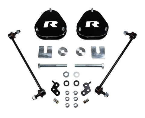 ReadyLIFT SST Lift Kit, full kit on a studio background: two black ReadyLIFT R strut spacers, two sway bar links, brackets, bolts and washers on white
