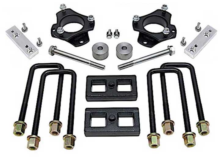 ReadyLIFT SST Lift Kit, full kit on a studio background: two black strut spacers, aluminum brackets, two flat rear blocks, U-bolts and bolts on white