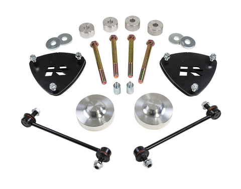 ReadyLIFT SST Lift Kit, full kit on a studio background: two black strut spacers, aluminum rear spacers, sway bar links, long bolts and washers on white