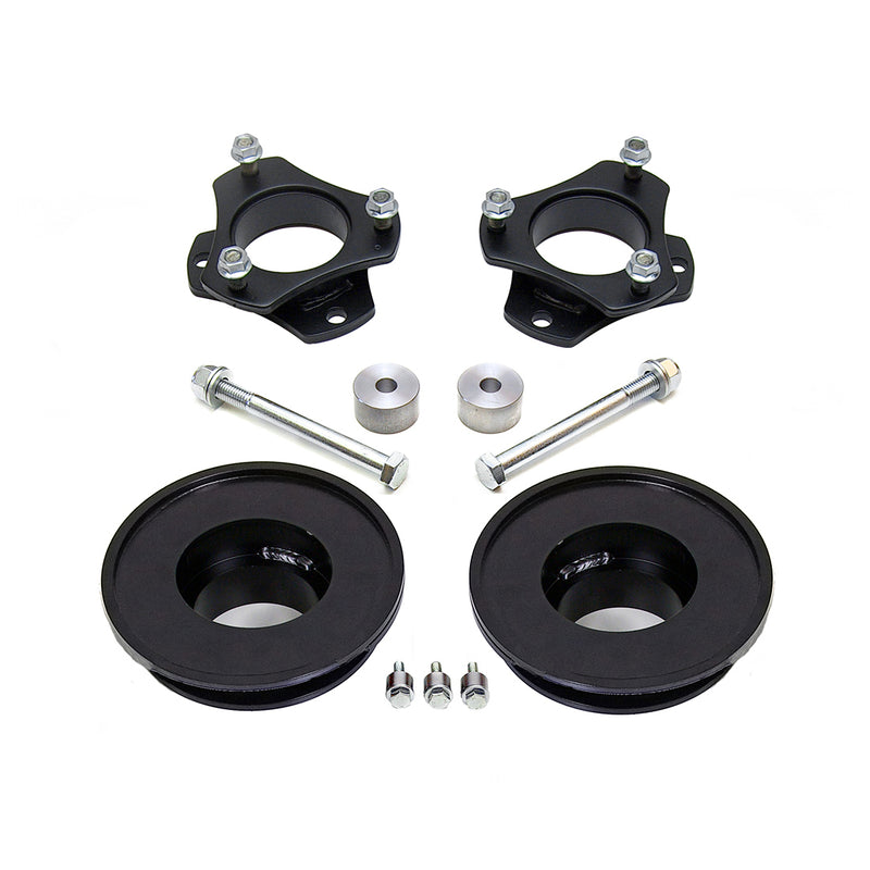 ReadyLIFT SST Lift Kit, full kit on a studio background: two black strut spacers, two black rear coil spacers, spacers and long bolts on white