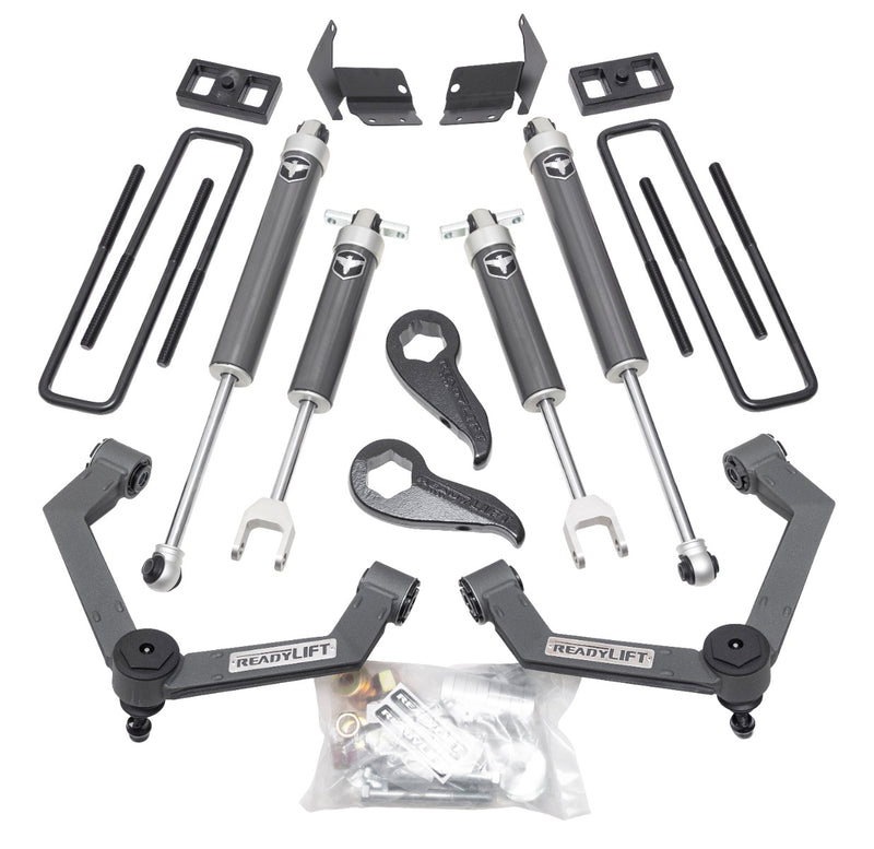ReadyLIFT SST Lift Kit, full kit on a studio background: two gray fabricated ReadyLIFT upper control arms, torsion keys, four Falcon shocks, blocks and U-bolts on white