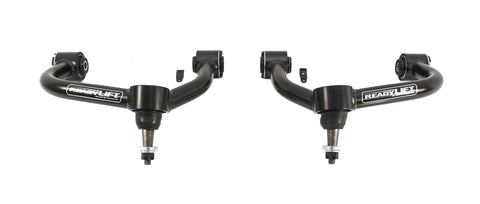 ReadyLIFT SST UCA, full kit on a studio background: A pair of black ReadyLIFT upper control arms with ball joints side by side on white