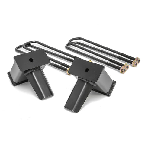 ReadyLIFT Tall Tapered Block, full kit on a studio background: two tall black fabricated tapered rear lift blocks in front of long square U-bolts with nuts on white