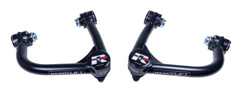 ReadyLIFT Tubular Upper Control Arms, full kit on a studio background: two black ReadyLIFT tubular upper control arms with red R caps facing each other on white