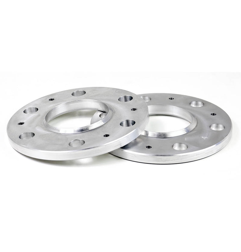 ReadyLIFT Wheel Spacers, full kit on a studio background: two thin machined aluminum hub-centric wheel spacers on white