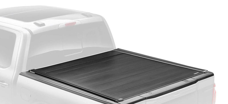 Retrax EQ retractable tonneau cover closed in full color on a ghosted pickup, rear three-quarter view