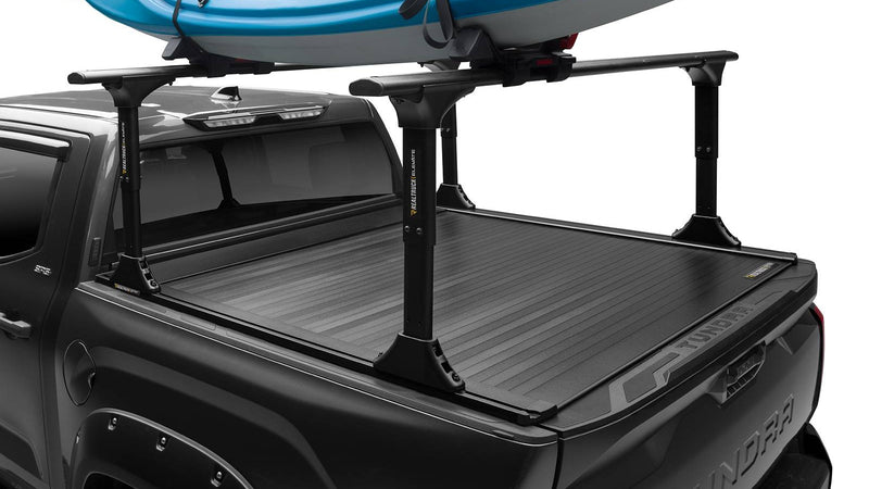Kayak on a Elevate rack over the closed Retrax EQ cover (rack and kayak carrier sold separately)