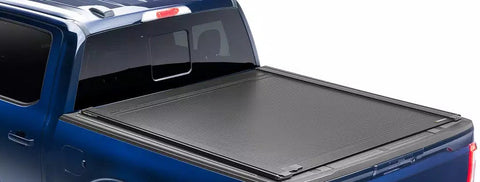 RetraxONE XR retractable cover fully closed on a blue pickup, rear three-quarter view