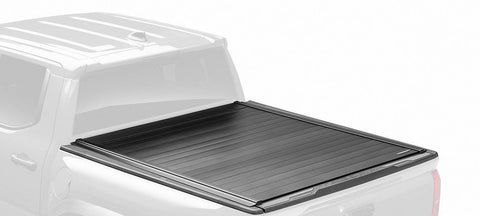 Retrax PowertraxPRO MX cover fully closed in full color on a ghosted pickup, rear three-quarter view