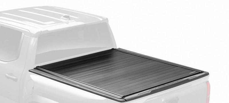 Retrax PowertraxPRO MX cover fully closed in full color on a ghosted pickup, rear three-quarter view