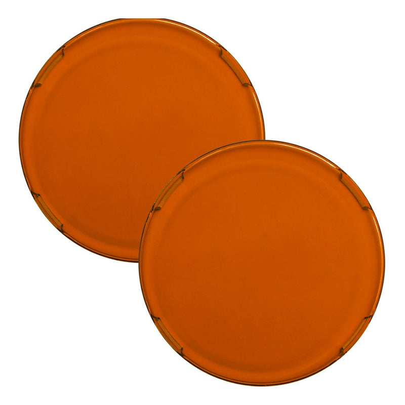Rigid 360-Series 6" Cover Pair on a studio background: A pair of translucent amber round 6" light covers overlapped on white