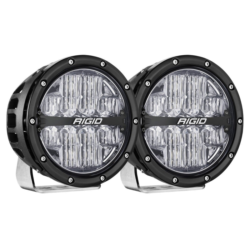 Rigid 360-Series PRO 6" Pair on a studio background: A pair of black 6" round LED lights with clear optics on polished brackets against white