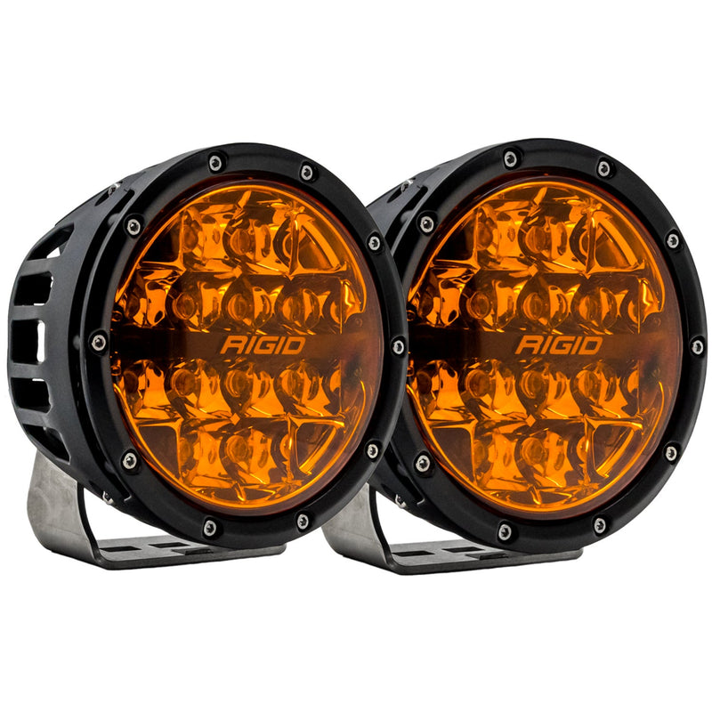 Rigid 360-Series PRO 6" Pair on a studio background: A pair of black 6" round LED lights with amber lenses on polished brackets against white