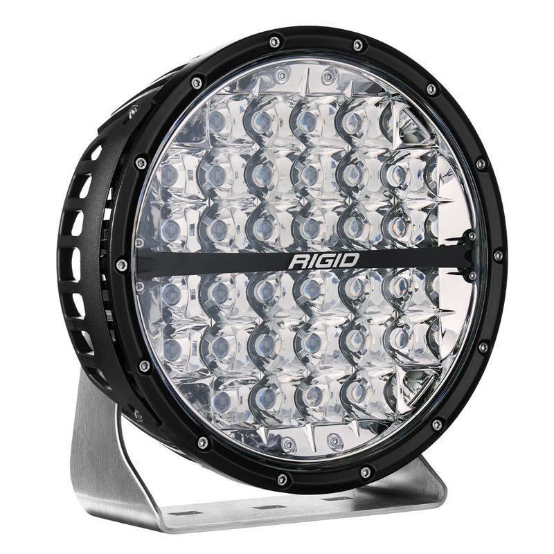 Rigid 360-Series PRO 9" on a studio background: black 9" round LED light with a clear multi-optic lens on an aluminum base bracket, three-quarter view on white