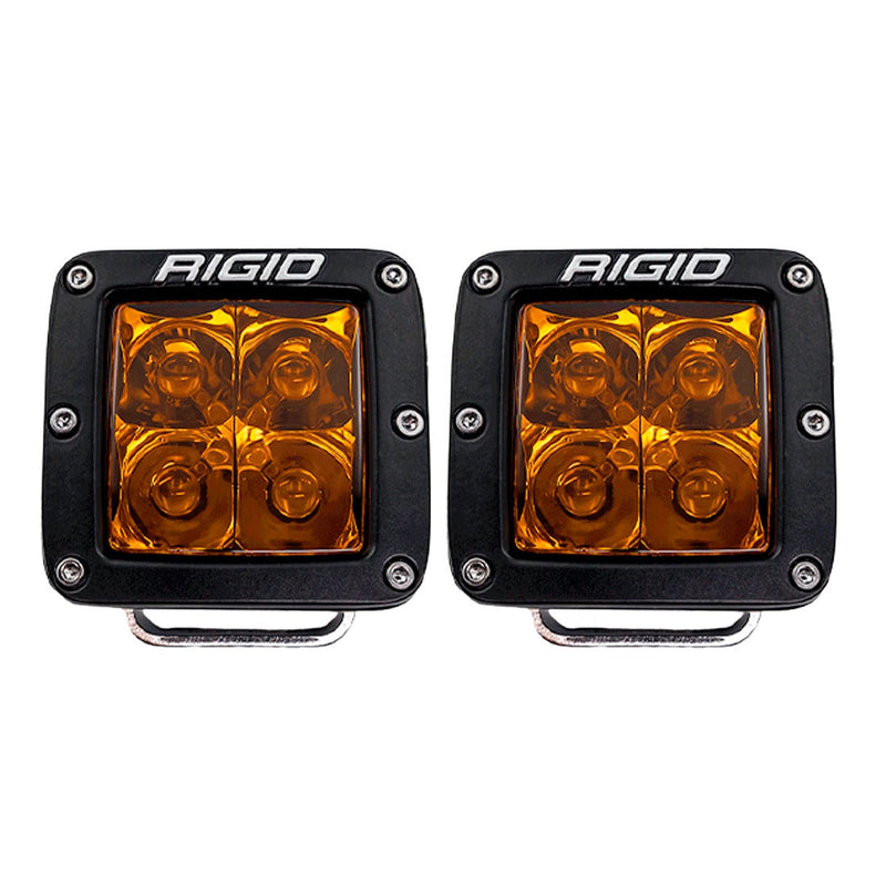 Rigid D-Series PRO Pods Pair on a studio background: A pair of black D-Series PRO pods with amber spot optics, front view on a white background