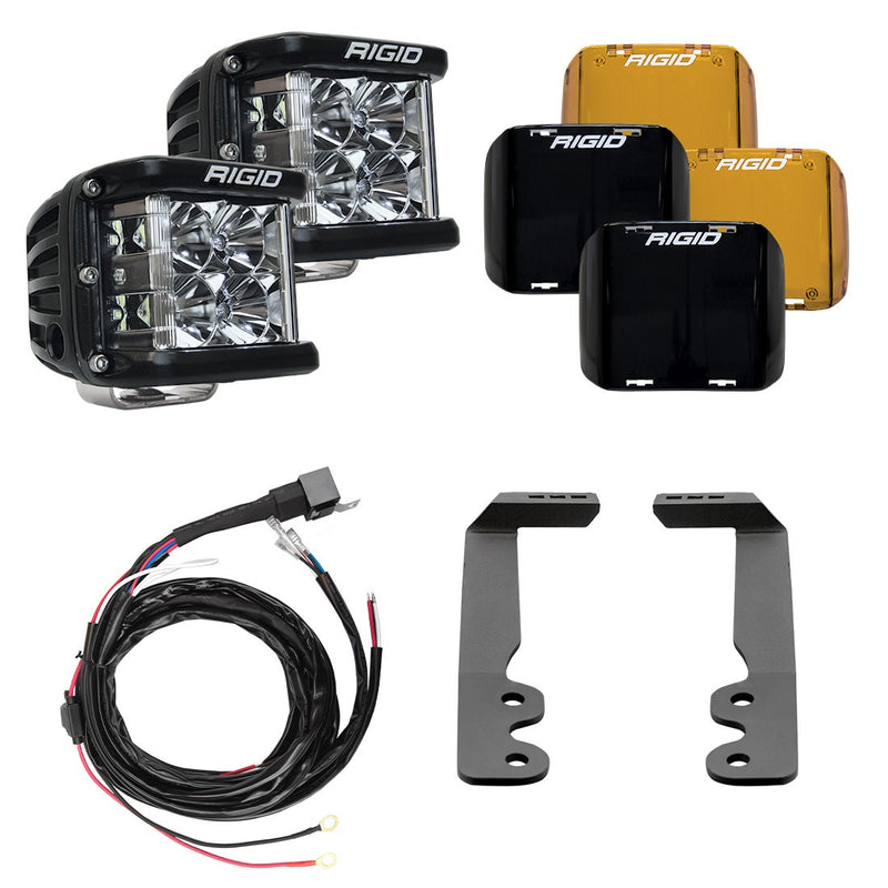 Rigid D-SS Drive A-Pillar Light Kit, kit contents laid out: kit layout of two D-SS cube LED lights with amber and black covers, a wiring harness and two A-pillar brackets on white
