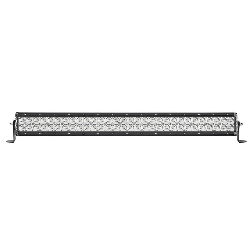 Rigid E-Series PRO 30" on a studio background: black 30" dual-row E-Series PRO LED light bar with clear lenses and spot optics on end-mount brackets against white