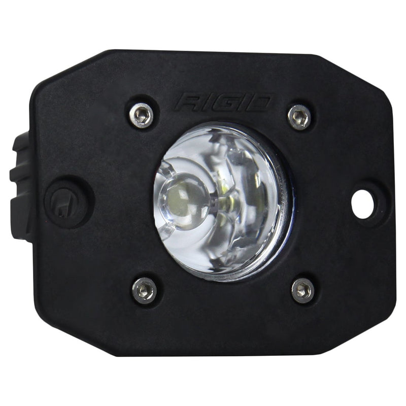 Rigid Ignite Flush Mount on a studio background: black Ignite flush mount light with a clear spot optic, slight angle view on white