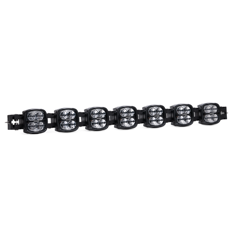 Rigid Phoenix 50" Connect Bar on a studio background: seven-pod connect bar on black with a rough white cutout edge along the housings