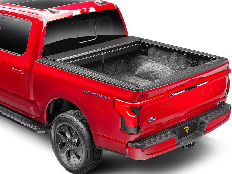 Roll-N-Lock A-Series fully retracted, rear three-quarter view of the open bed