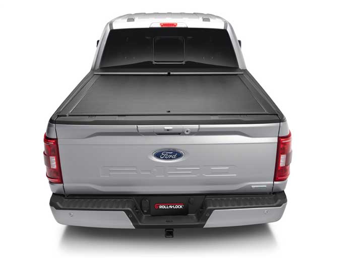 Roll-N-Lock M-Series closed, straight rear view of a 2021 Ford F-150 with the tailgate up
