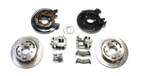 TeraFlex Brake Component, shown on a studio background: rear disc brake conversion kit laid out on white: backing plates, calipers, pads, TERA-stamped rotors and hardware