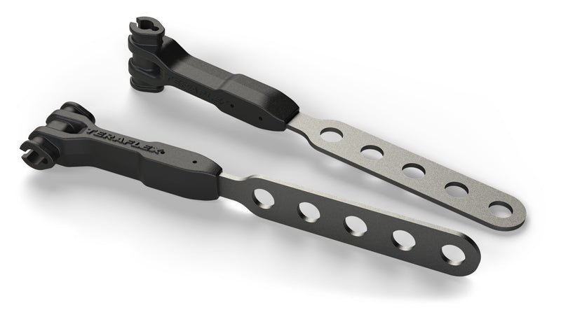 Pair of TeraFlex brake line anchor brackets with five mounting holes on a white background