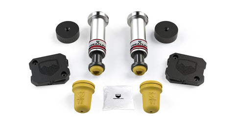 TeraFlex Bump Stop Kit, shown on a studio background: TeraFlex SpeedBump bump stops, yellow Falcon bump stops, spacers and pads on white
