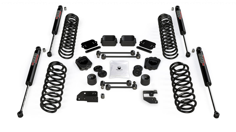 TeraFlex Coil Spring Lift Kit, shown on a studio background: four coil springs, four 9550 shocks, spacers, links and brackets on white