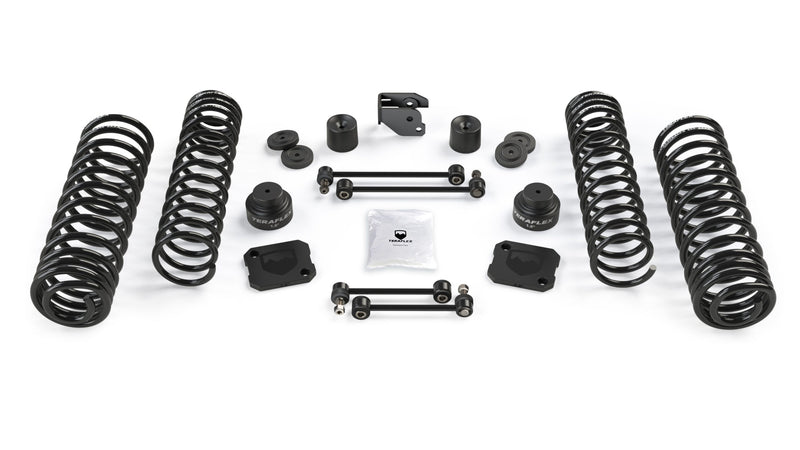 TeraFlex Coil Spring Lift Kit, shown on a studio background: TeraFlex lift kit: four coil springs, 1.5" spacers, bump stops, bracket, four sway bar links and hardware pack on white