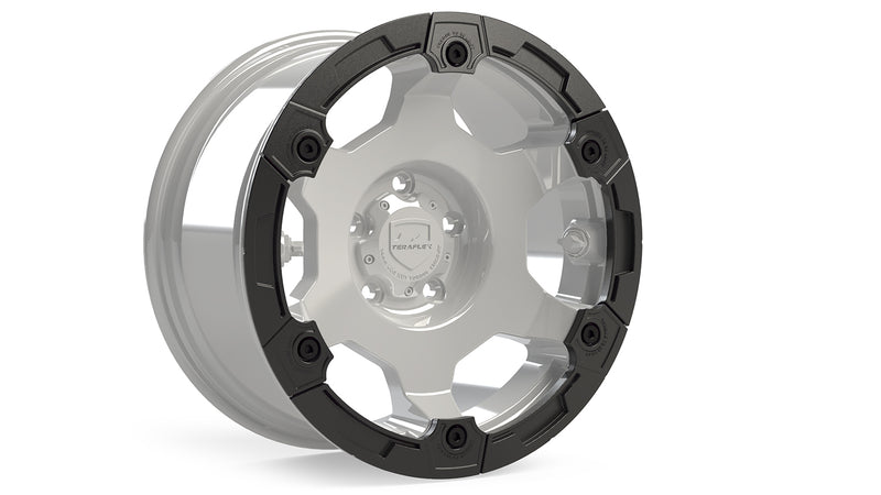 TeraFlex modular rash ring in black fitted to a wheel shown in gray