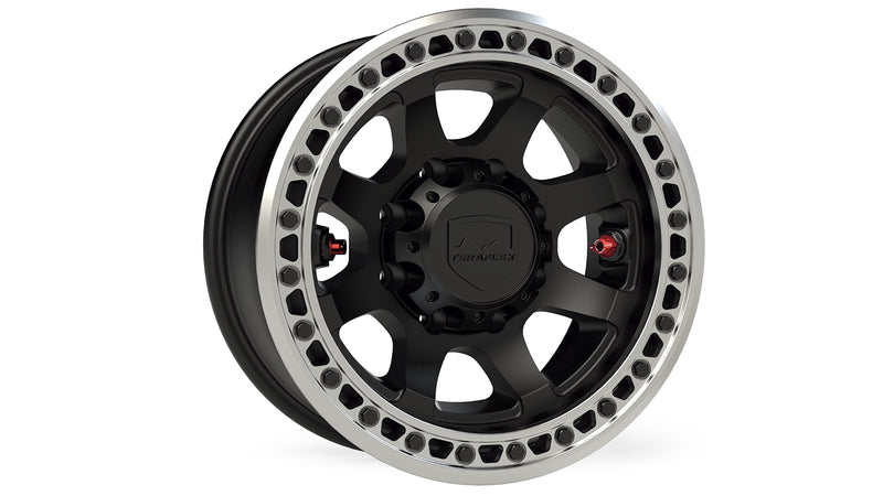 TeraFlex Off-Road Wheel, shown on a studio background: matte black 8-lug wheel with machined bolted beadlock ring, red valve stems and TeraFlex cap on white