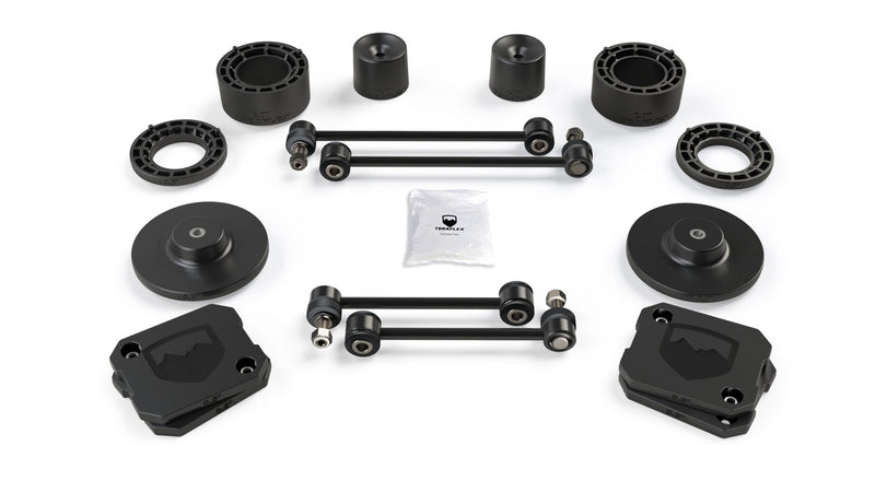 TeraFlex Performance Spacer Lift Kit, shown on a studio background: TeraFlex spacer lift kit: 2" coil spacers, bump stop spacers, 0.5" rings, rear spacers, four sway bar links and hardware pack on white