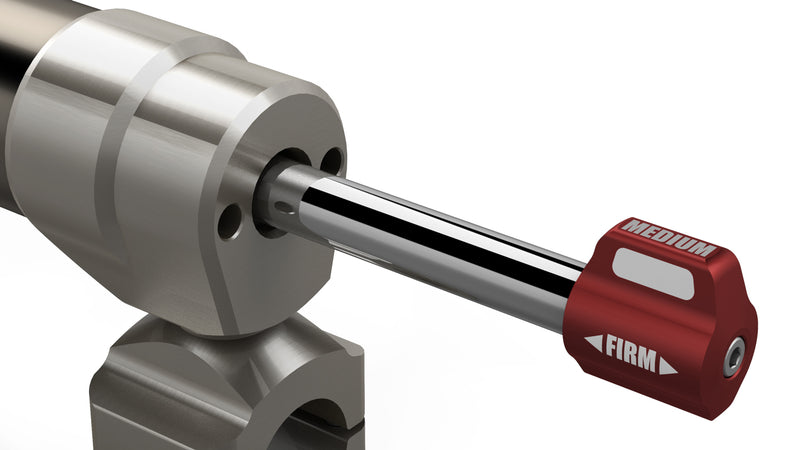 Close-up of the TeraFlex Steering Stabilizer: close-up render of a red Falcon adjuster knob marked MEDIUM and FIRM on a stabilizer shaft