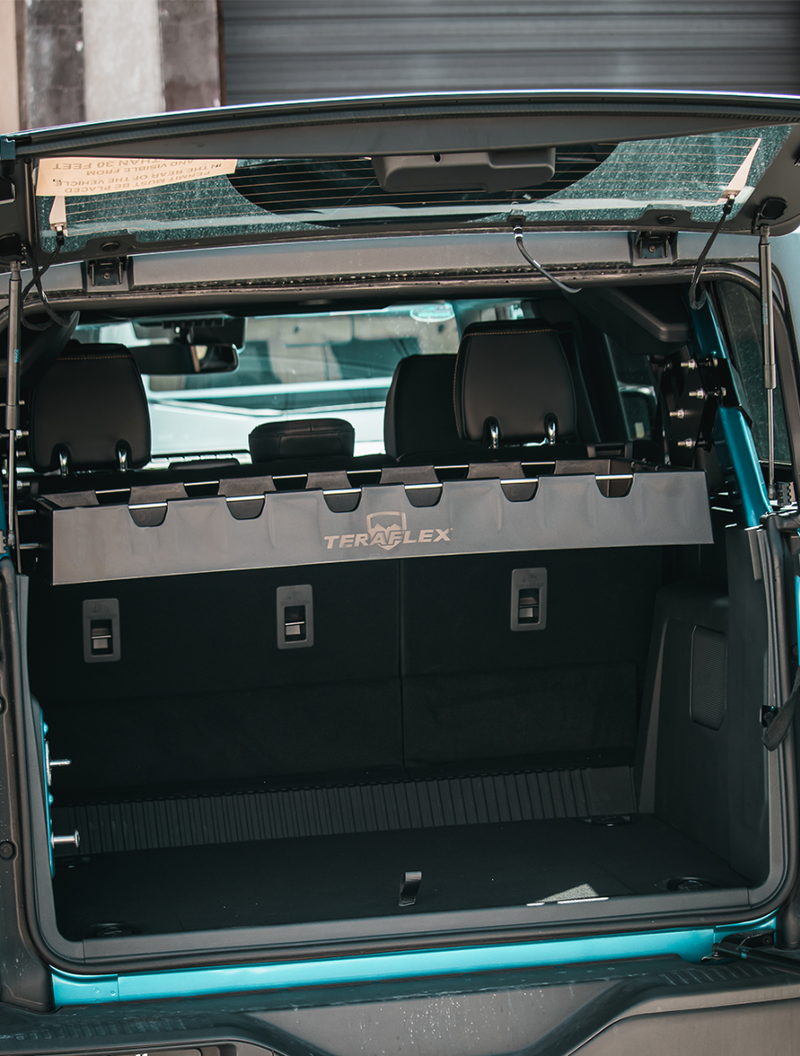 TeraFlex Sierra rear cargo rack installed behind the rear seat of a 4-door Ford Bronco