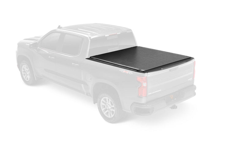 Ghosted pickup render highlighting the black soft folding tonneau cover closed over the bed