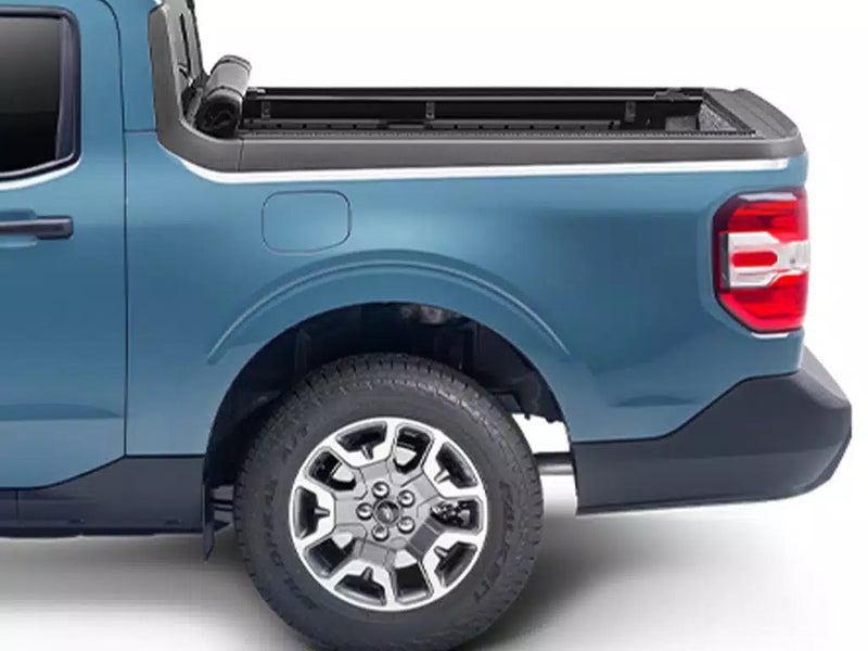 Side profile with the soft cover fully rolled up against the cab, bed open