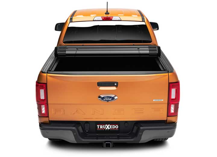 TruXedo Sentry CT hard roll-up tonneau cover rolled partway open on a 2019-2023 Ford Ranger, straight rear view