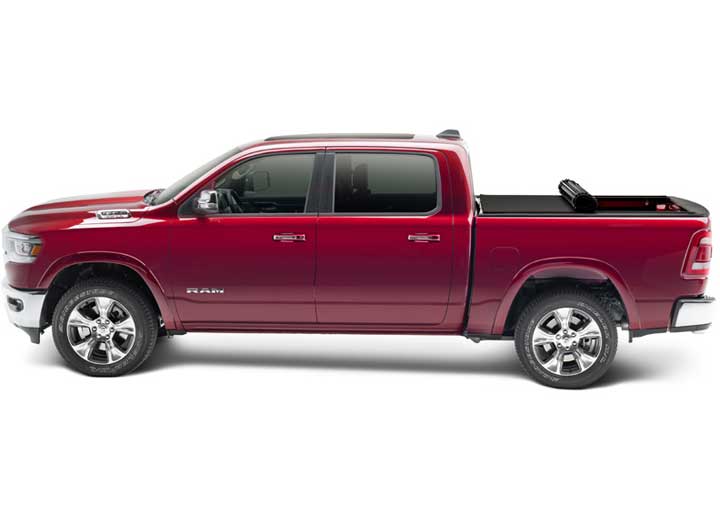 TruXedo Sentry CT hard roll-up tonneau cover rolled partway open on a 2019-2024 Ram 1500, side profile
