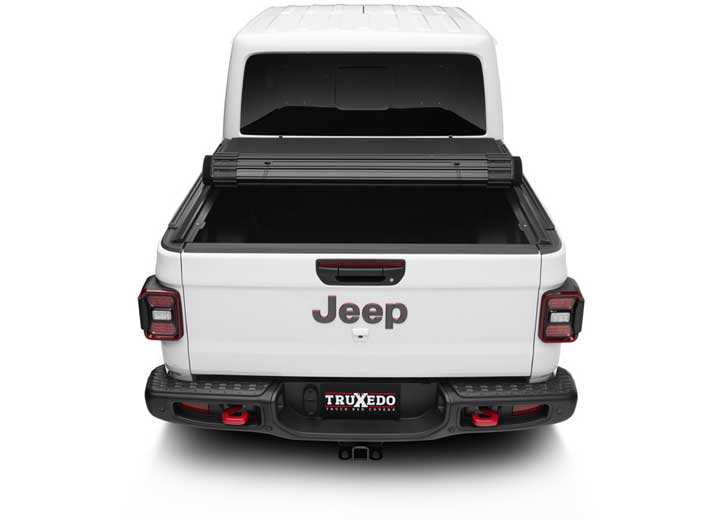 TruXedo Sentry CT hard roll-up tonneau cover rolled partway open on a 2020-2024 Jeep Gladiator, straight rear view