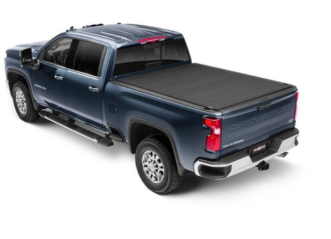 TruXedo Sentry CT hard roll-up tonneau cover closed over the bed of a pickup truck, widest view