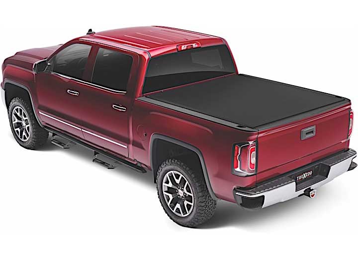 TruXedo Sentry CT hard roll-up tonneau cover closed over the bed of a pickup truck, rear three-quarter view