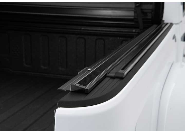 Close-up of the side rail on a TruXedo Sentry CT hard roll-up tonneau cover