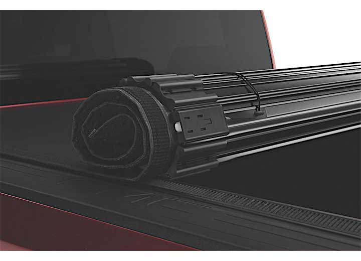 Close-up of the security latch on a TruXedo Sentry CT hard roll-up tonneau cover