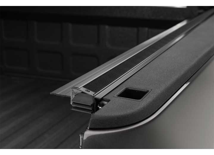 Close-up of the side rail on a TruXedo Sentry CT hard roll-up tonneau cover