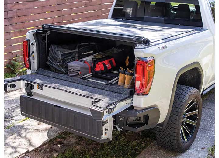 TruXedo Sentry hard roll-up tonneau cover fully open on a 2019-2024 GMC Sierra 1500, photographed on location