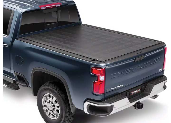 TruXedo Sentry hard roll-up tonneau cover closed over the bed of a pickup truck, rear three-quarter view