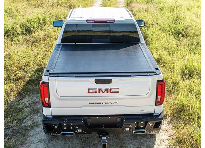 TruXedo Sentry hard roll-up tonneau cover closed over the bed of a pickup truck, photographed on location