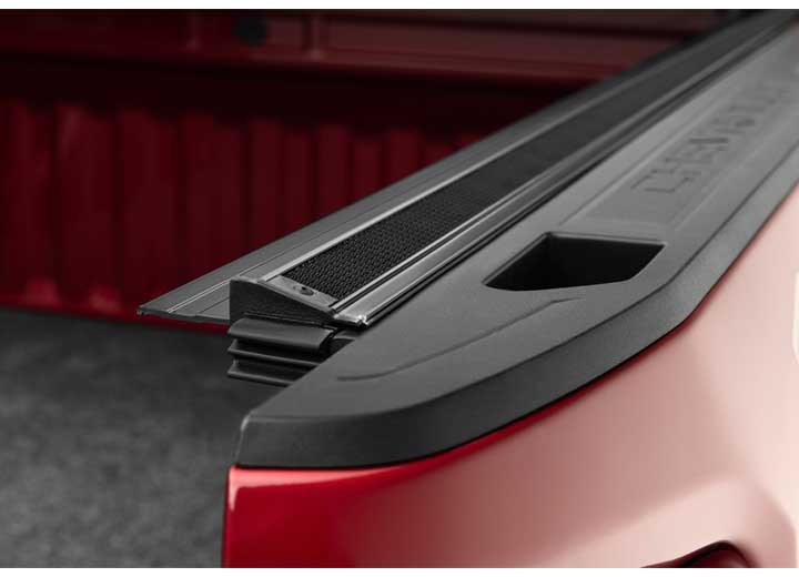 Close-up of the side rail on a TruXedo Sentry hard roll-up tonneau cover